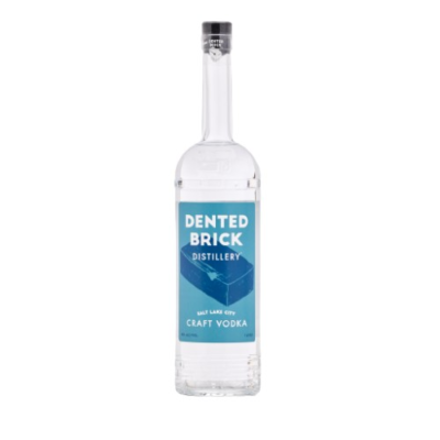 DENTED BRICKED CRAFT GIN 1L features a complex flavor profile characterized by a blend of traditional botanicals