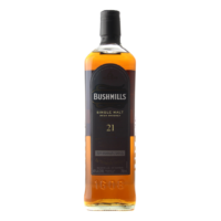 BUSHMILLS 21 YR is a premium Irish whiskey that features a complex flavor profile with notes of fruit cake
