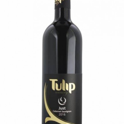 TULIP CAB SAUV 750ML is a robust red wine from the renowned wine region of Israel. It features a rich flavor profile with notes of dark fruits