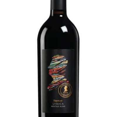 The HAYOTZER LYRICA MERITAGE 750ML is a blended red wine characterized by its rich flavors of dark berries