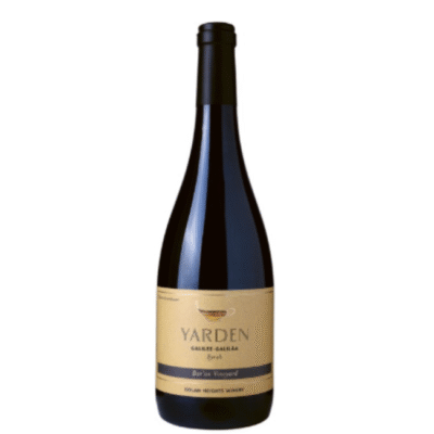 The Yarden Syrah Baron Vineyard 750ml is a robust red wine hailing from the Golan Heights in Israel. This Syrah showcases a rich flavor profile characterized by dark fruit notes of blackberry and plum