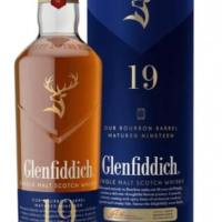 GLENFIDDICH SINGLE MALT 19 YR is a premium Scotch whisky hailing from the Speyside region of Scotland. This single malt showcases a complex flavor profile with notes of dark chocolate