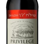 SHILOH PRIVILEGE 750ML is a premium wine hailing from the renowned vineyards of Israel. This wine features a complex flavor profile with notes of dark fruits